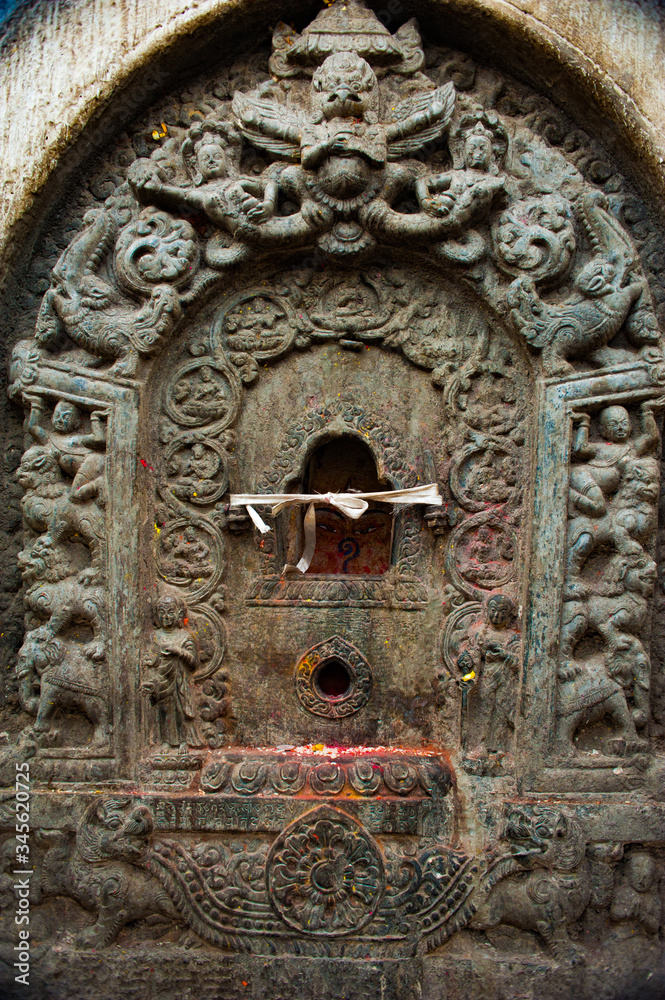 Details at Swayambhunath Temple Complex - Buddhist Center and Village on the Outskirts of Kathmandu in Nepal Details at Swayambhunath Temple Complex - Buddhist Center and Village on the Outskirts of Kathmandu in Nepal