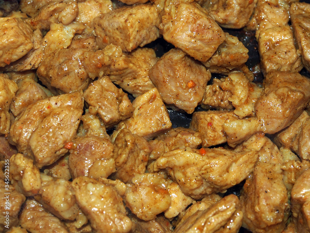 Stew seasoned with spices, delicious slices close-up. Healthy food, a natural product full of proteins. Stew seasoned with spices, delicious slices close-up. Healthy food, a natural product full of proteins.