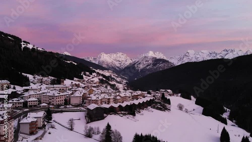 Drone shot of Italian village during a colourful sunset 