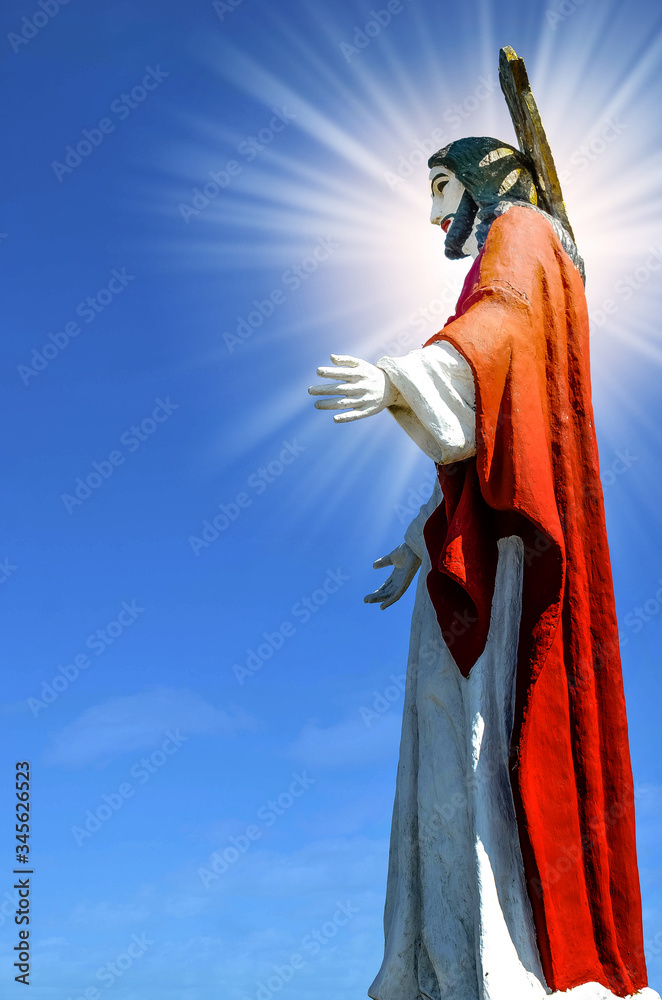 Fototapeta premium Statue of Christ facing the city of Manila in the Philippines