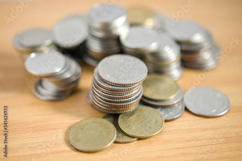 Business Concept, Finance investment saving up money for great financial purpose growing in market and business capital, gross profit with coin stacked in pile with copyspace