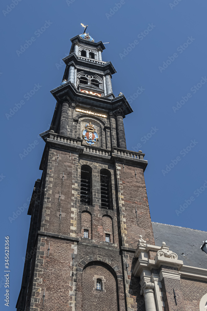 View of Western Church (Westerkerk, 1620 - 1631) - a Dutch Protestant church in Amsterdam. It lies in the most western part of the Grachtengordel neighborhood. Amsterdam, Netherlands.