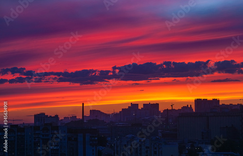 beautiful sunset in the big industrial city © Ekaterina Shvaygert