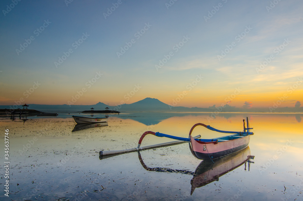 Sanur Sunrise with Indonesian traditional boat