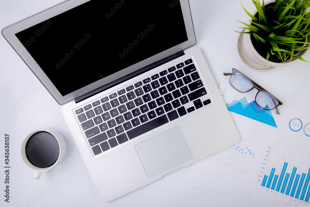Work from home, business with laptop computer and graph of report financial of profit or earning on desk, statistics of marketing and investment, document of diagram and chart for planning strategy. Work from home, business with laptop computer and graph of report financial of profit or earning on desk, statistics of marketing and investment, document of diagram and chart for planning strategy.