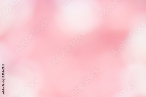Blurry pink flowers as abstract bokeh background
