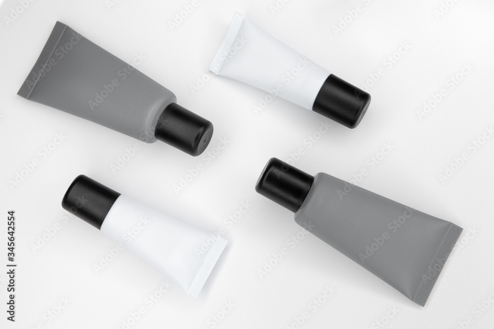 Tubes with cosmetics on a white background. Tubes with cosmetics on a white background.