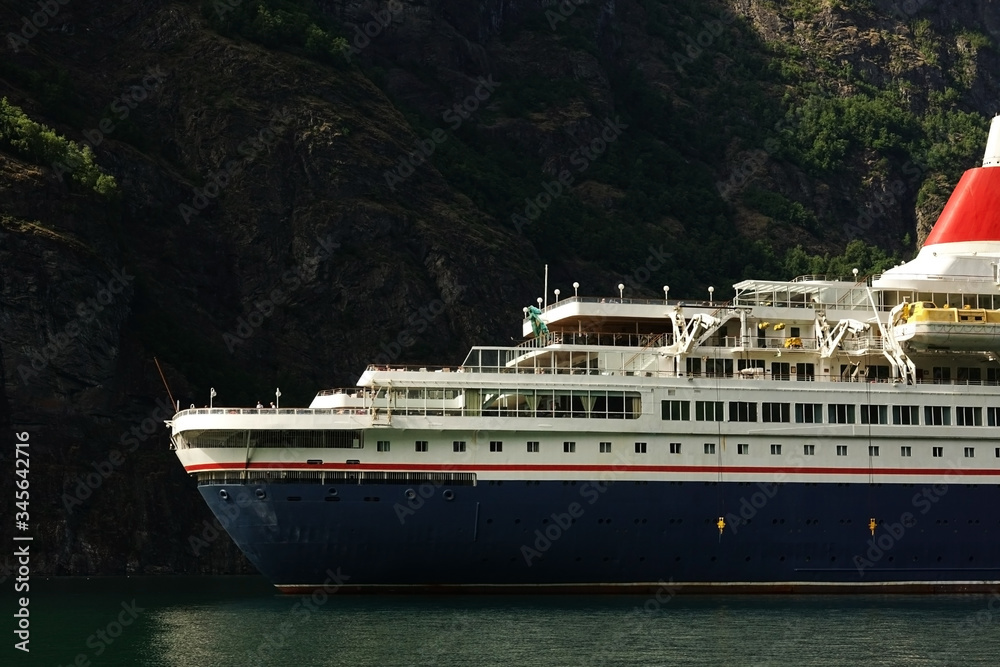 Cruise ship sailing the fjord in Norway Cruise ship sailing the fjord in Norway