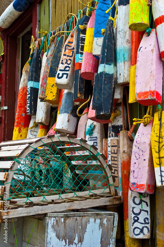Lobster Buoys Hanging on Wall, Hulls Cove, Maine, USA photo