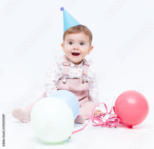 Baby birthday party with ballons