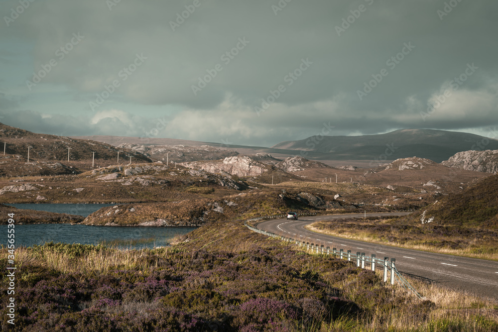 Scenic Road Across Landscape of Scotland at Autumn