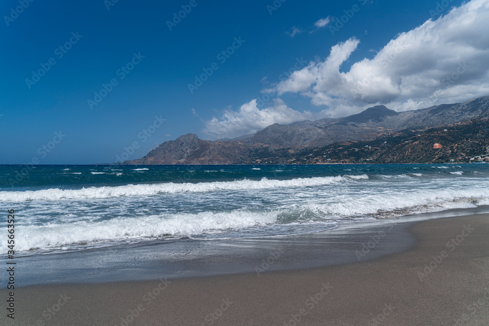 bay on crete with mountain range, beach and sea bay on crete with mountain range, beach and sea