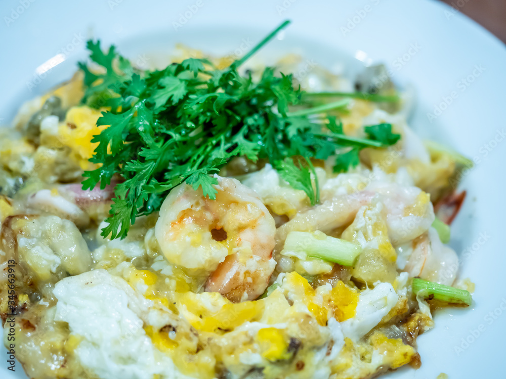 Chinese oyster, shrimp and squid omelette fried with bean sprouts