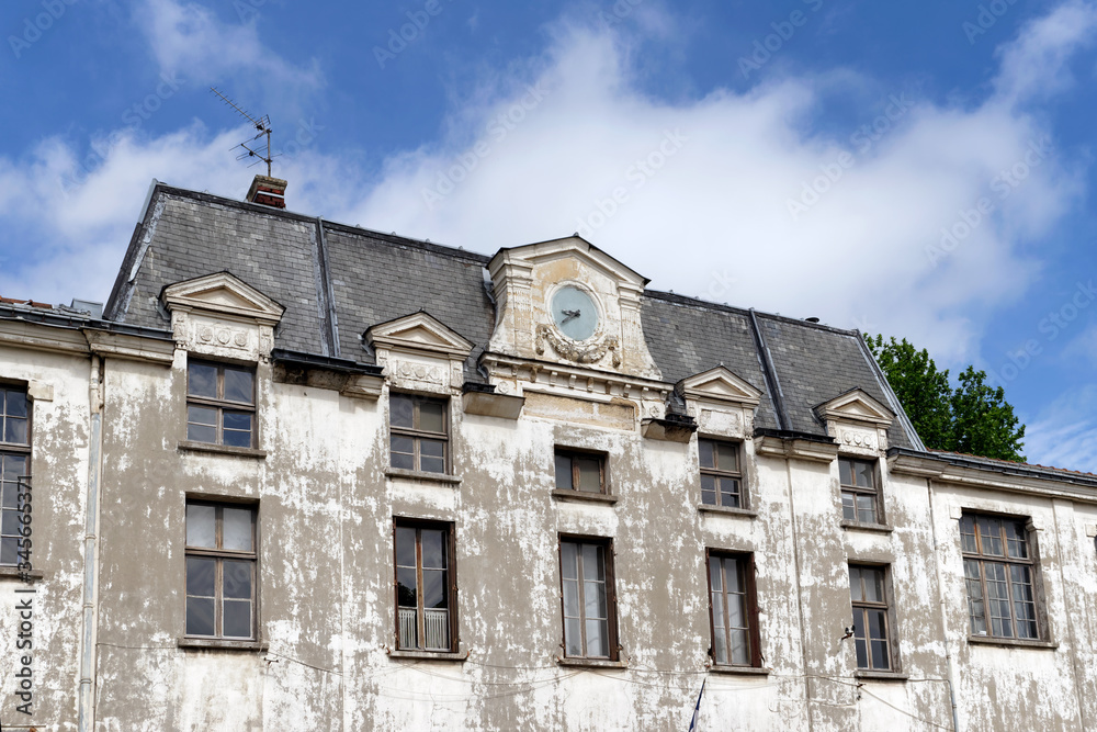 Facade of old public school in Paris suburb.  Ivry sur Seine city
