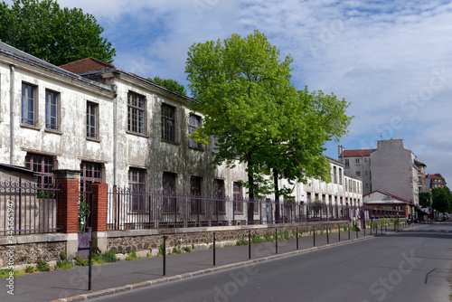 Facade of old public school in Paris suburb.  Ivry sur Seine city photo