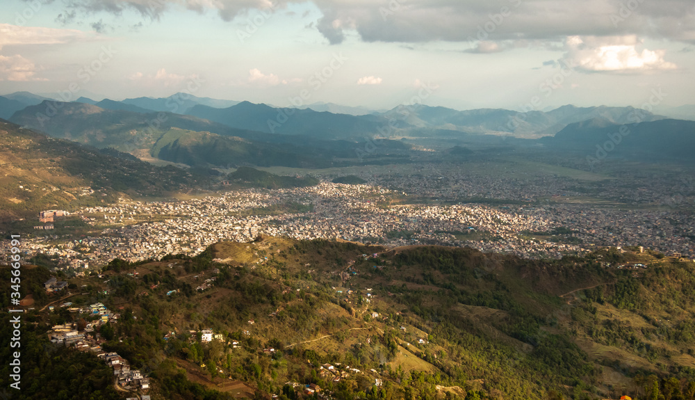 Fototapeta premium An aerial view of the city of Pokhara in Nepal and the hills surrounding the city.