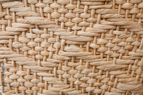 Handmade straw bag texture with geometric pattern