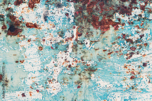 Blue and white painted metal texture with rust