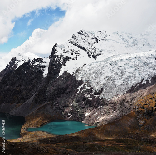 Lake and Ausangate mountain, in the Vilcanota mountain range. Andes of Peru.