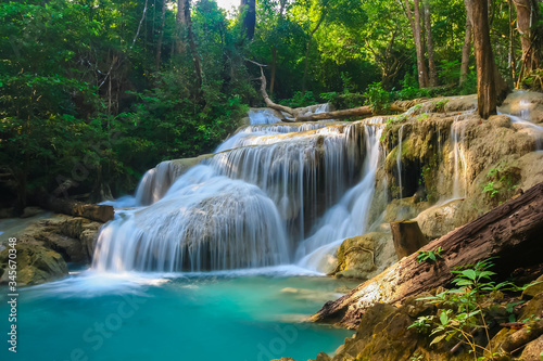 Fototapeta Naklejka Na Ścianę i Meble -  The beautiful Erawan cascade waterfall with turquoise water like heaven at the tropical forest ,Kanchanaburi Nation Park, Thailand