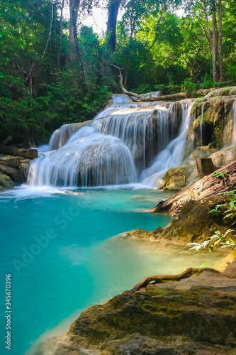 The beautiful Erawan cascade waterfall with turquoise water like heaven at the tropical forest ,Kanchanaburi Nation Park, Thailand