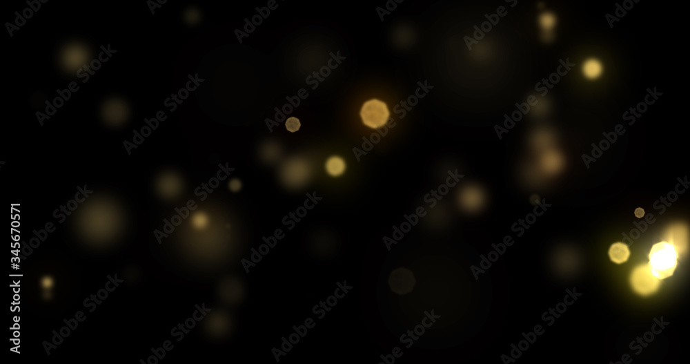 Bokeh light gold shine background with abstract blur flare effects. Golden yellow glitter particle flares with bright glowing shiny light bokeh sparkles on black background Bokeh light gold shine background with abstract blur flare effects. Golden yellow glitter particle flares with bright glowing shiny light bokeh sparkles on black background