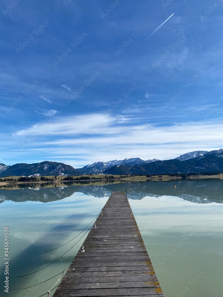 wooden bridge over lake