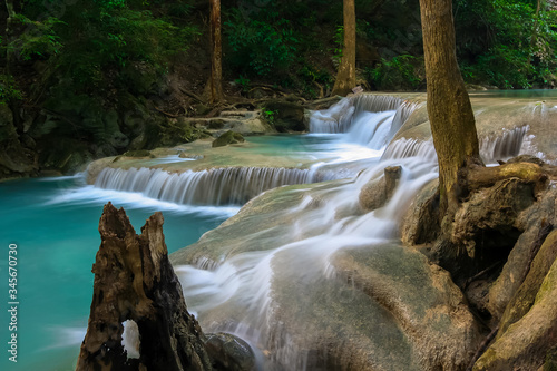 The beautiful Erawan cascade waterfall with turquoise water like heaven at the tropical forest ,Kanchanaburi Nation Park, Thailand