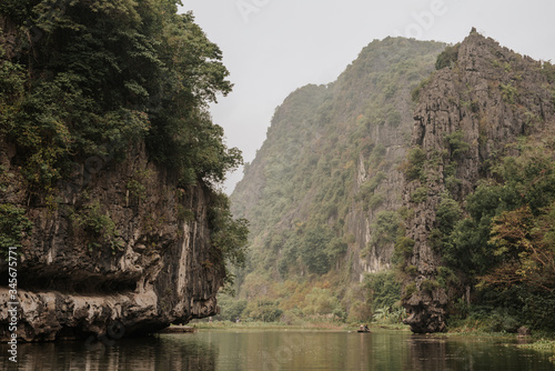  Landscape of Karst formation in the water along the Ngo Dong River at the Tam Coc National Park, Ninh Binh Province, Vietnam. Most spectacular scenery in Vietnam's.