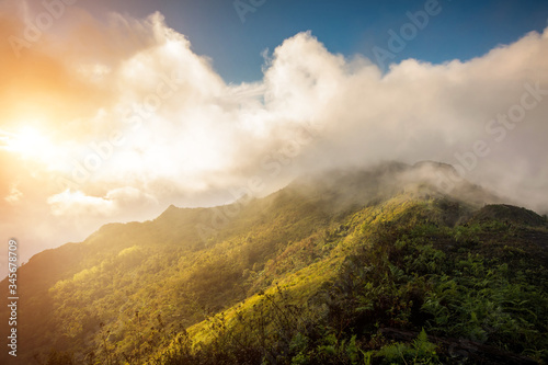 Beautiful of multiple mountains valley at sunrise in the morning at Phu chi Duen, Chiang Rai Province, Thailand photo