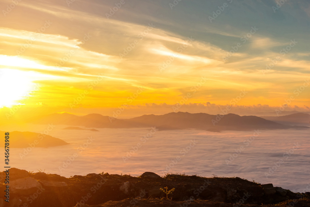 Beautiful of multiple mountains valley at sunrise in the morning at Phu chi Duen, Chiang Rai Province, Thailand