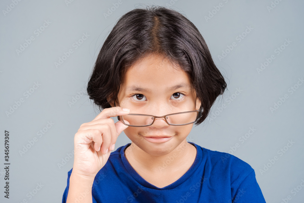 Child Looking Over Eyeglasses Child Looking Over Eyeglasses