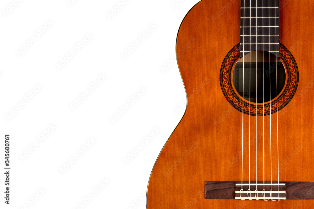 Obraz premium Acoustic guitar neck with body and strings on white background in close-up