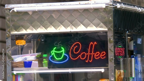 Coffee Shop Street Sign on kiosk in 4K Slow motion 60fps