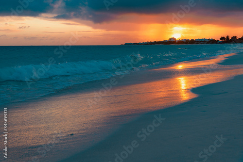 colorful tropical sunset on Anguilla island Caribbean sea © DD25