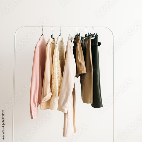 Capsule clothes in beige and pink colors closeup