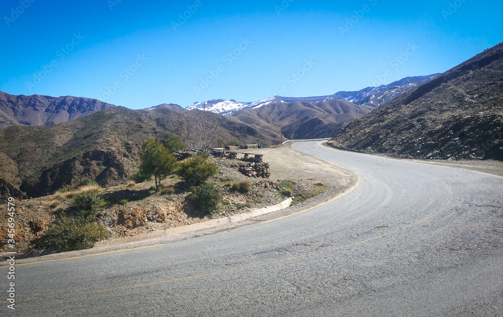 Beautiful view in a empty road in Atlas Mountains, Morocco in a sunny day