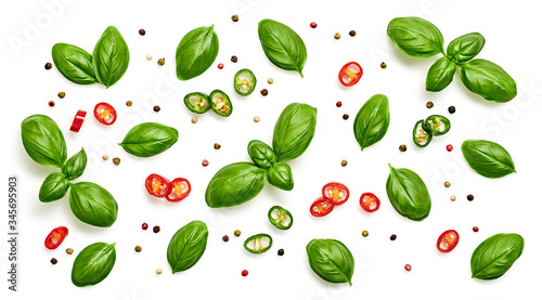 Basil, spices, pepper, garlic pattern. Vegan diet food, creative green basil background isolated on white. Fresh basil leaf layout, cooking concept, fashion wallpaper