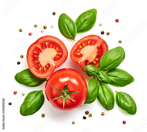 Tomato cherry, basil, spices, pepper. Fresh organic tomatoes, isolated on white. Vegan veggies diet food. Basil, cherry tomatoes, cooking concept, closeup, top view.