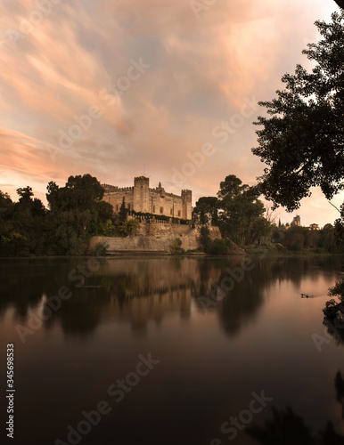 castillo de malpica de tajo con su reflejo en el rio  photo