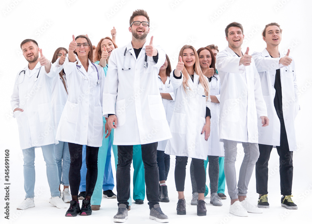 large group of diverse doctors giving a thumbs up large group of diverse doctors giving a thumbs up