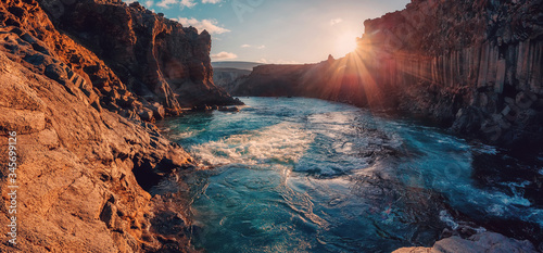 Iceland river in basalt canyon under sunlit. magical vulcanic landscape, Iceland. wonderful picturesque Scene. Amazing nature landscape.