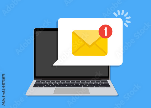 Laptop with email notification speech bubble in a flat design