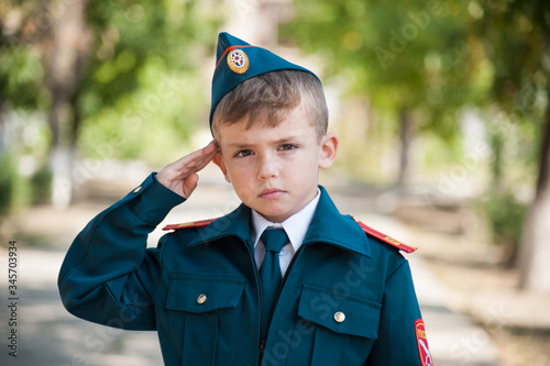 cadet boy in uniform on the street. Study at school
