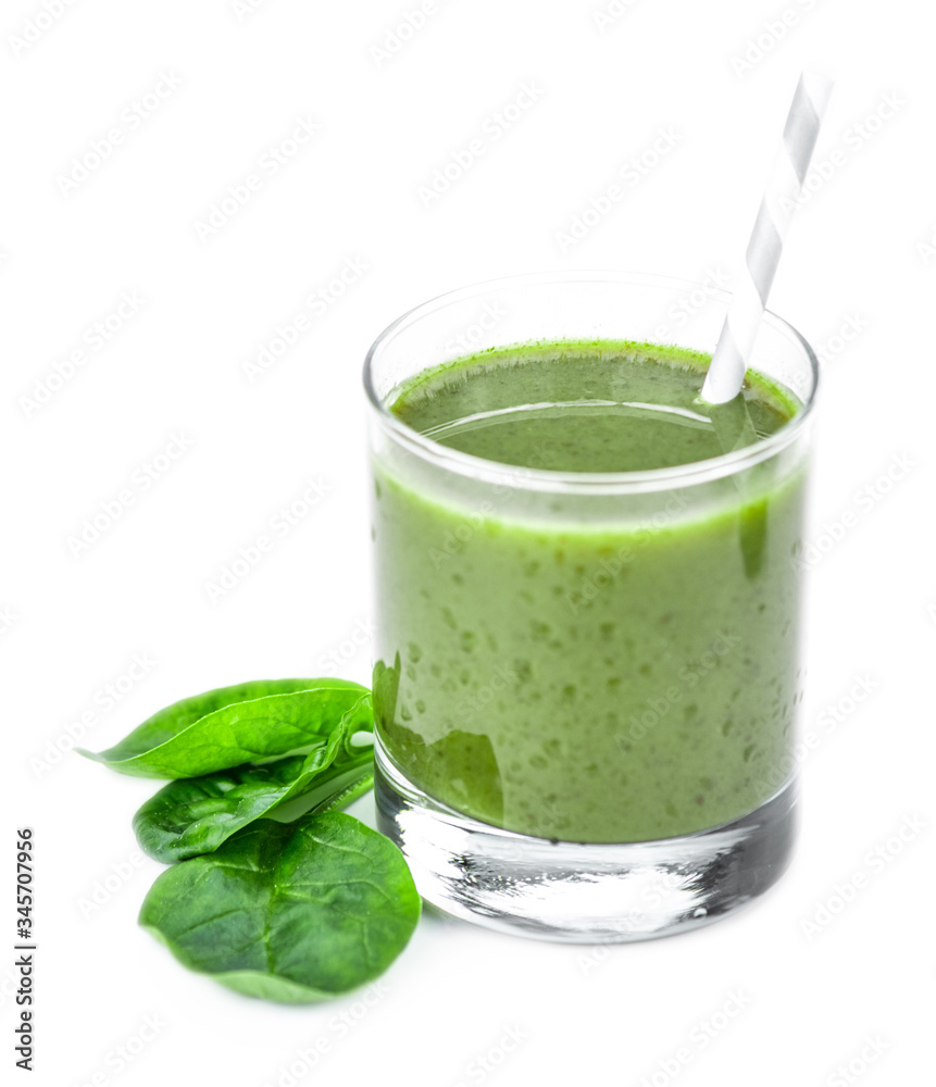 Homemade spinach smoothie isolated on white (close up; selective focus) Homemade spinach smoothie isolated on white (close up; selective focus)
