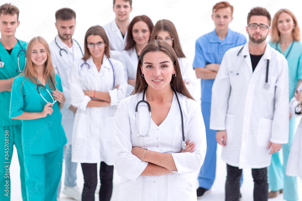 large group of medical professionals applauding their leader large group of medical professionals applauding their leader