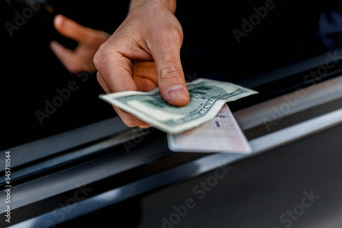 Close-up of a bribe on the road.