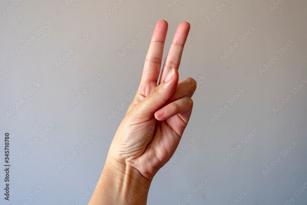 Fototapeta hand showing peace and love sign