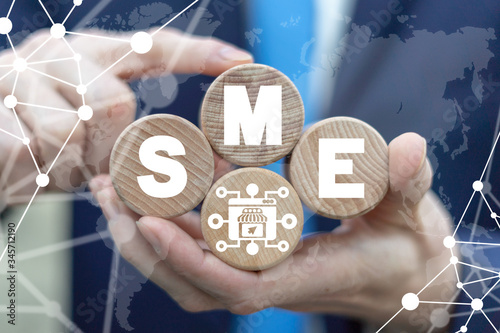 SME Small and Medium-sized Enterprises Concept. Business model. Key to success. photo