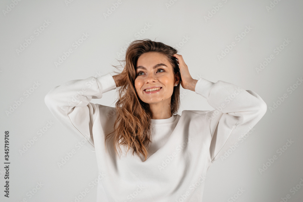 Sensual young adult woman with beautiful brown hairs, posing isolated on white Sensual young adult woman with beautiful brown hairs, posing isolated on white